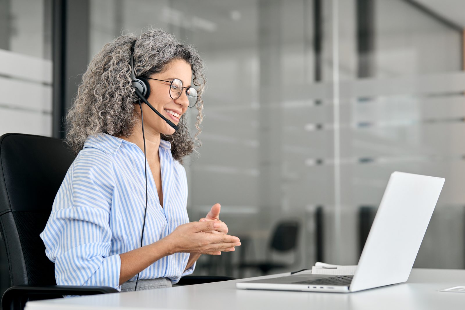 Female customer service representative answering a call